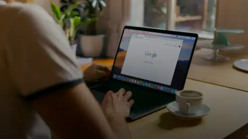 laptop screen web search results developer desk — illustration for article on How to Stop Prompt