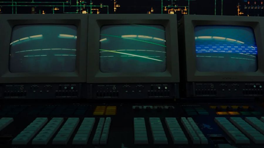 Three old crt monitors display a line