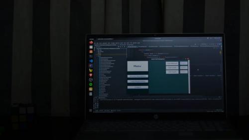 black hp laptop computer turned on displaying desktop