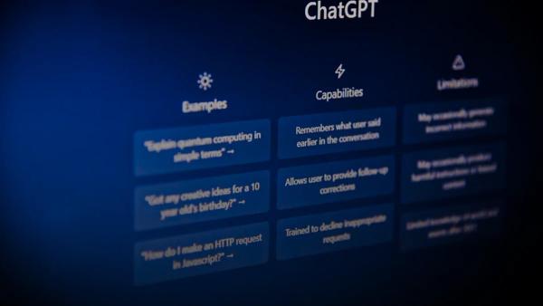 The ChatGPT interface showing examples, capabilities, and limitations on a dark blue screen