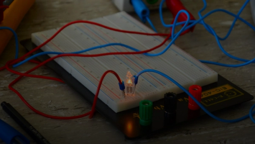 green and orange electric wires