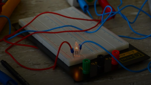 green and orange electric wires