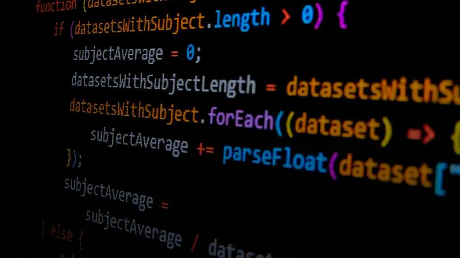 JavaScript code displayed on a dark screen with colorful syntax highlighting