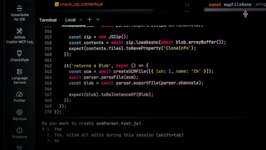 Computer screen displaying code and terminal prompts