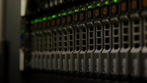 Server rack with blinking green lights