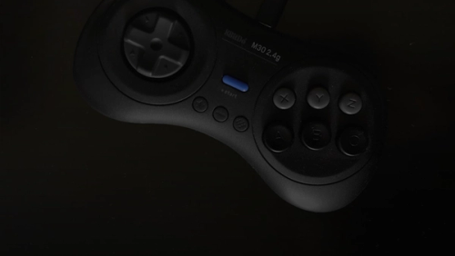 gray and black SEGA Genesis controller