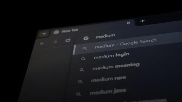 Browser search bar with medium suggestions