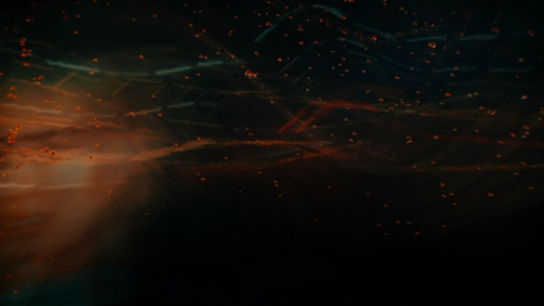 a blurry image of a bright orange and blue light