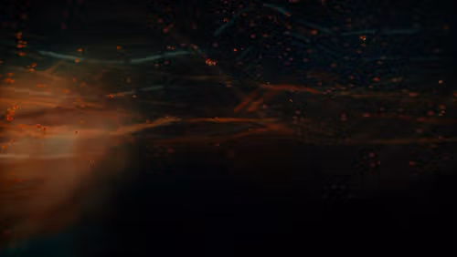 a blurry image of a bright orange and blue light