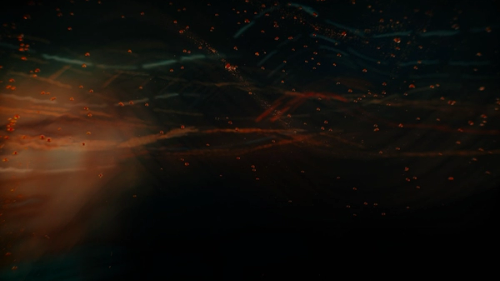 a blurry image of a bright orange and blue light