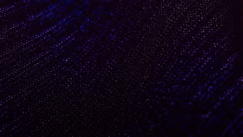 Abstract pattern of small lights on dark background