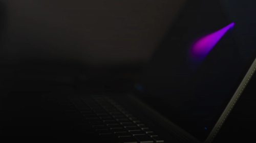 USB flash drive attached to laptop computer