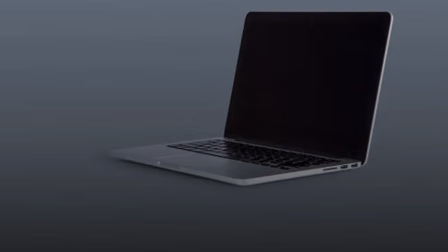 an open laptop computer sitting on top of a table