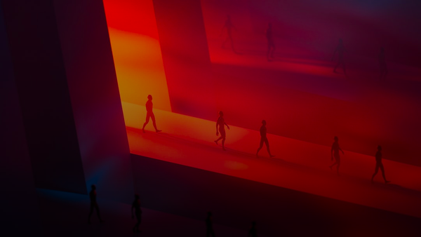 Silhouettes walking on a red illuminated runway.