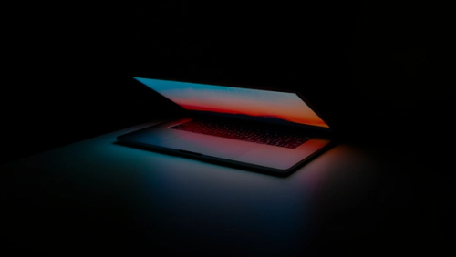 gray and black laptop computer on surface
