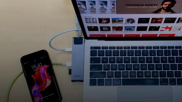 smartphone connected to laptop computing cables — illustration for article on Phone as GPU for Local