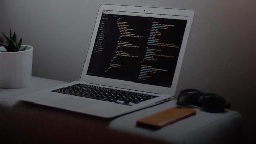 turned on MacBook Air on desk