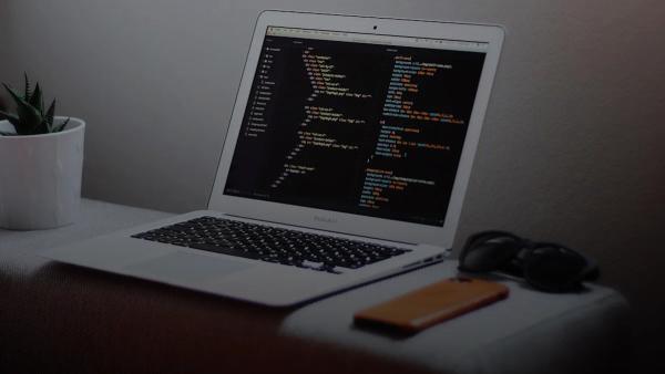turned on MacBook Air on desk