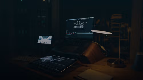 black laptop computer on brown wooden stand
