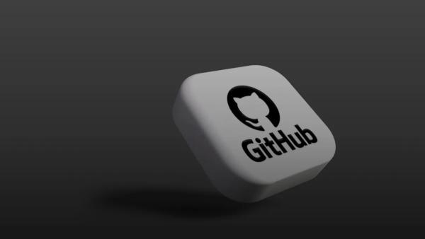 a white dice with a black github logo on it