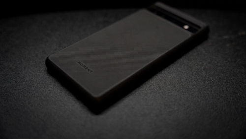 a close up of a cell phone on a table