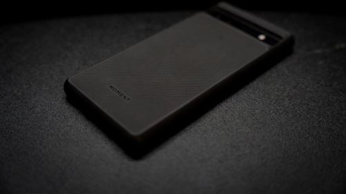 a close up of a cell phone on a table