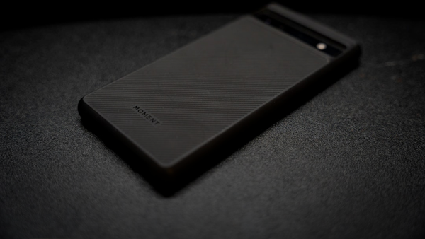 a close up of a cell phone on a table