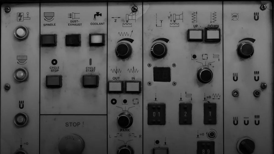 a close up of a control panel with buttons and switches