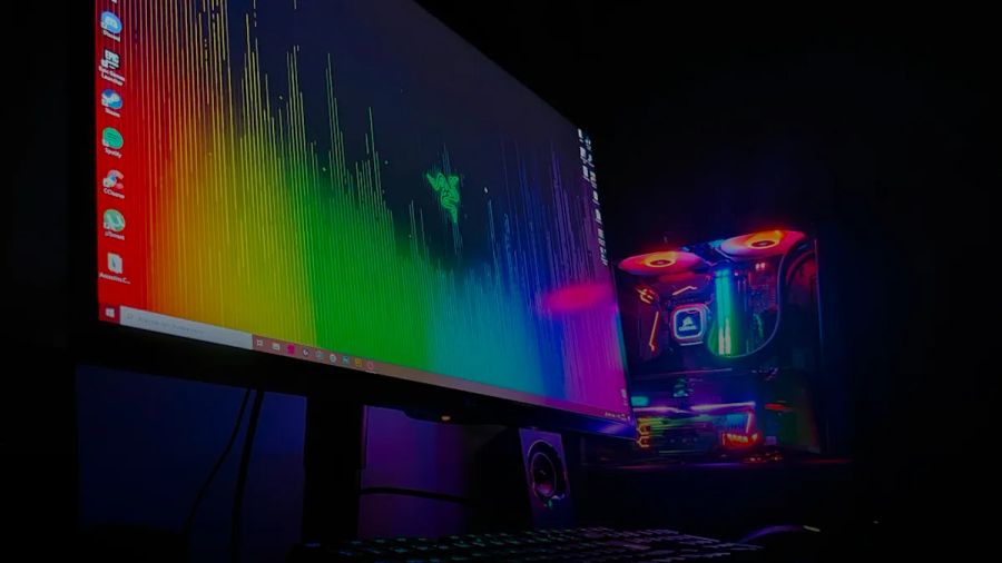 black flat screen computer monitor turned on beside black computer keyboard