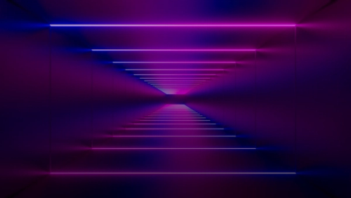 a purple light in a dark room