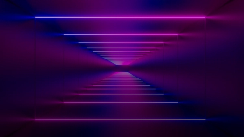 a purple light in a dark room