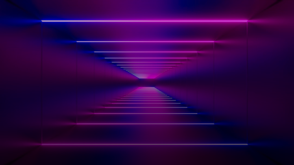 a purple light in a dark room