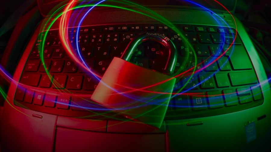 padlock on laptop with light trails